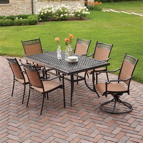 The table to this set is made of powder coated steel. . Hampton bay 7 piece patio set